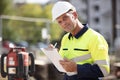 architect checking insulation during house construction