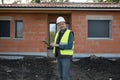 Architect cheking house under construction Royalty Free Stock Photo