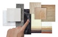 architect choosed interior material samples including oak wooden ceramic flooring tiles, drapery fabric catalog palette, marble