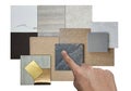 architect chooses interior material samples including gold stainless, gold metallic aluminum, palette of stone tiles, wooden