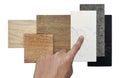 architect chooses wood and artificial stone samples. ceramic flooring tiles and quartz stones samples isolated on background. Royalty Free Stock Photo