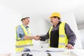 Architect and construction engineer handshake. Royalty Free Stock Photo