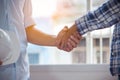 Architect contractor shaking hands with client after seal a deal to renovate building Royalty Free Stock Photo