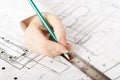 Architect design working drawing sketch plans blueprints and making architectural construction Royalty Free Stock Photo