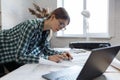 Architect drawing blueprints in office. Engineer sketching a construction project. Architectural plan. Close-up portrait Royalty Free Stock Photo