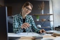 Architect drawing blueprints in office. Engineer sketching a construction project. Architectural plan. Close-up portrait Royalty Free Stock Photo