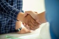 Architect and engineer construction workers shaking hands after successful collaboration Royalty Free Stock Photo