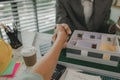 architect and engineer are shaking hand after successfully completing the work, an architect is consulting with an engineer about Royalty Free Stock Photo