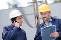 architect and engineer talking on construction site Royalty Free Stock Photo
