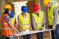 Architect explaining plan to group of workers