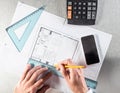 Architect hands making measurements, working at desk for construction concept Royalty Free Stock Photo