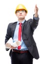 Architect in helmet showing his hand to the construction site Royalty Free Stock Photo