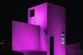 Pink geometric shapes of rock and roll hall of fame museum in Cleveland Ohio illuminated at night