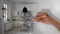 Architect interior designer concept: hand drawing a design interior project while the space becomes real, retro white kitchen with Royalty Free Stock Photo