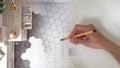 Architect interior designer concept: hand drawing a design interior project while the space becomes real, white scandinavian kitch