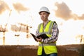 Architect man holding a project book plan Royalty Free Stock Photo