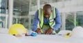 Architect man, tablet and blueprint planning, construction and project development or renovation. Engineering contractor Royalty Free Stock Photo