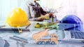 architect man working with laptop and blueprints,engineer inspection in workplace for architectural plan,sketching a construction Royalty Free Stock Photo