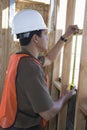 Architect Measuring Window