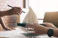 Architect reviewing architectural model in the office. Royalty Free Stock Photo