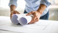 Architect\'s Hands Unrolling Blueprints: Architectural Plans, Design, Construction Concept Royalty Free Stock Photo
