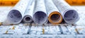 Architect s rolled blueprint plan and technical project drawing for construction Royalty Free Stock Photo