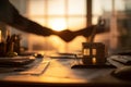 Architect's Workspace at Golden Hour with Handshake and Model Building Royalty Free Stock Photo
