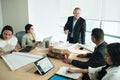 Architect Showing Miniature Building At Business Meeting With Client Royalty Free Stock Photo