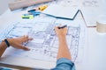 Architect sketching, planning or drawing an architectural design plan or blueprint diagram with draw tools, equipment Royalty Free Stock Photo