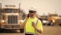 architect supervisor or construction engineer man talking on phone at building site Royalty Free Stock Photo