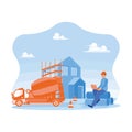 Architect using laptop at building construction site. Sit on the big pipe near the cement mixer car. Royalty Free Stock Photo