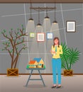 Architect woman designer, project manager standing near installation of small house, female engineer Royalty Free Stock Photo