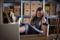 Architect woman office warehouse talking mobile Royalty Free Stock Photo