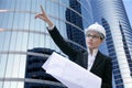 Architect woman working outdoor with buildings Royalty Free Stock Photo