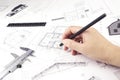 Architect working on blueprint. Construction concept. Engineering tools. Architectural plan,technical project and constructions Royalty Free Stock Photo