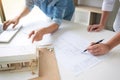 Architect working on blueprint, Engineer meeting working with pa Royalty Free Stock Photo