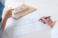 Architect working on blueprint, Engineer meeting working with pa Royalty Free Stock Photo