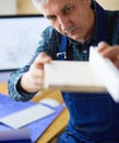 Architect working on drawing table in office Royalty Free Stock Photo