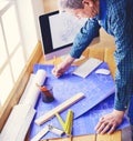 Architect working on drawing table in office Royalty Free Stock Photo