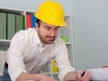 Architect working on his projects papers Royalty Free Stock Photo