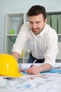 Architect working on his projects papers in the office Royalty Free Stock Photo