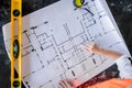 Architect working over plan. Closeup Desk With blueprints drawing Royalty Free Stock Photo