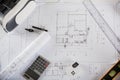 Architect workplace top view. Architectural blueprint paper project plans on desk table Royalty Free Stock Photo