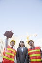 Architects and businesswoman at a construction site, Beijing Royalty Free Stock Photo