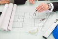 Architects discussing blueprints Royalty Free Stock Photo