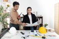 Architects Discussing Building Models and Blueprints Royalty Free Stock Photo