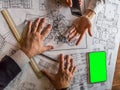 Architects engineer discussing on desk with blueprint. Team group on construciton site check documents and business Royalty Free Stock Photo