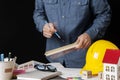 Architects,engineer, Interior Design choose color materials design to build the building on desk in the office. Construction and Royalty Free Stock Photo