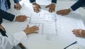 Architects and Engineers Collaborating on Project Blueprints Royalty Free Stock Photo
