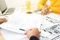 Architects or landscape designers discussing blueprints Royalty Free Stock Photo